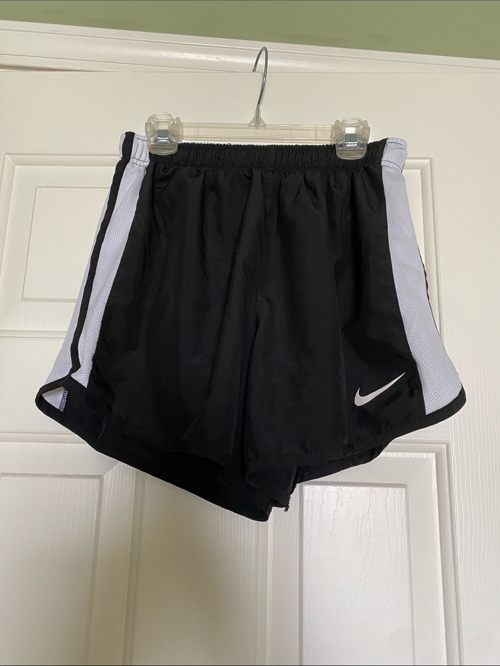 Nike Black Athletic Shorts with White Side Panels and Swoosh
